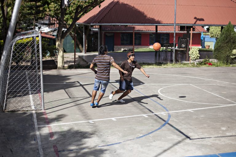 ©PATRICIO CROOKER Santa Cruz, Bolivia July 2016 Fernando (right), a 16 years old boy, playing soccer in the cement court inside Techo Minardi one of six Don Bosco program shelters in the city of Santa Cruz.